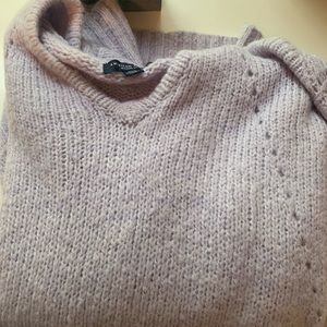 Lilac V-neck hooded sweater.